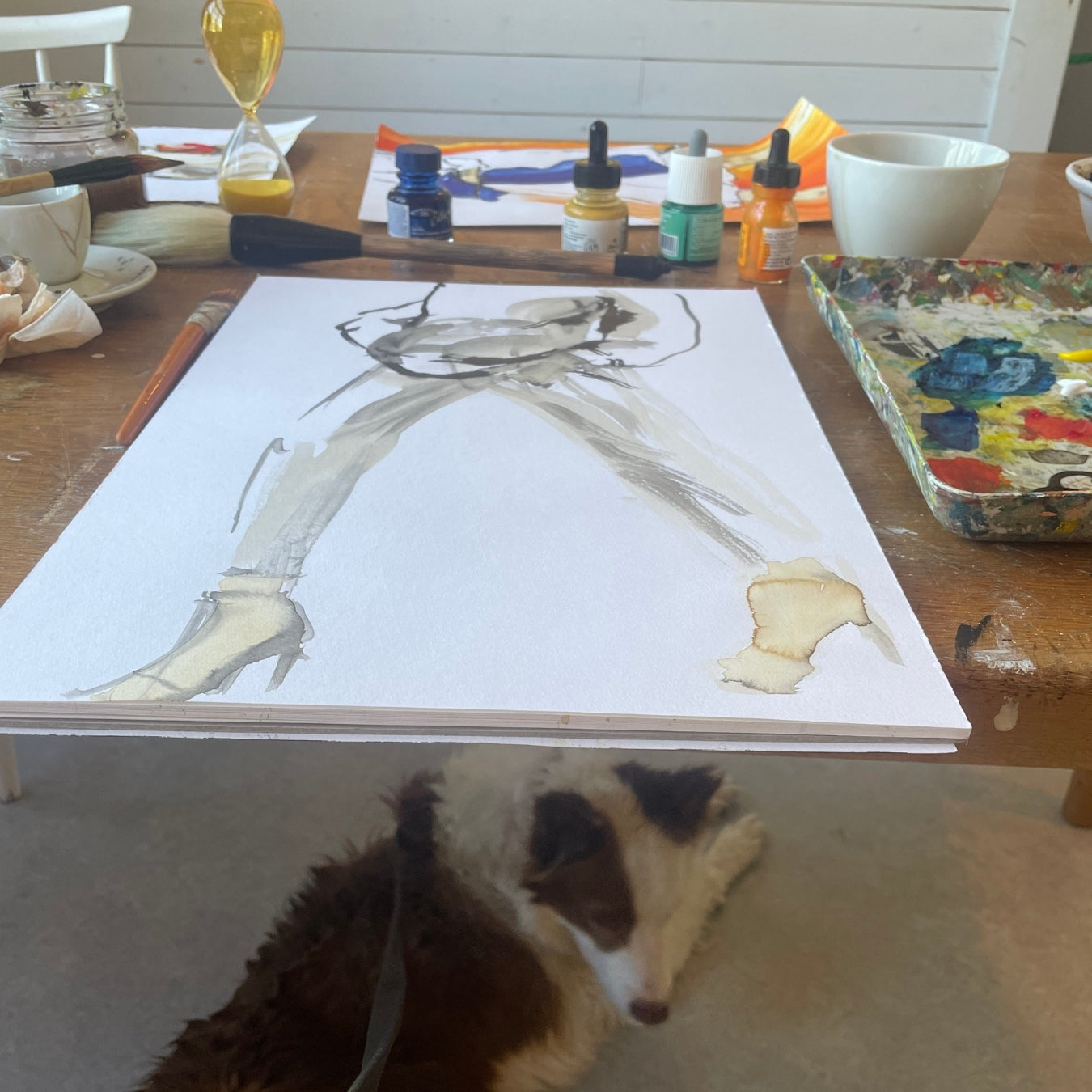 Painting process of Coffee to Go with the studiodog Tilda, artist Ingela Johansson