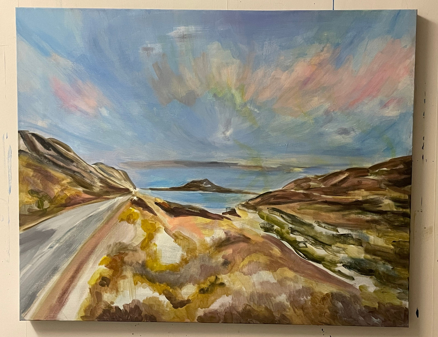 Painting process of the artwork ‘Goodmorning,’ a colorful sunrise landscape with glowing sky, water, and rolling hills painted by Swedish artist Ingela Johansson.