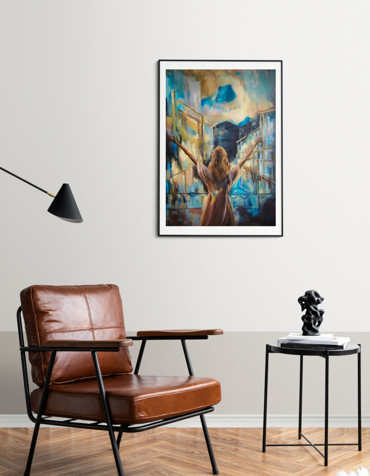 Framed I Am Wild Possibility fine art print by Swedish artist Ingela Johansson above a leather armchair
