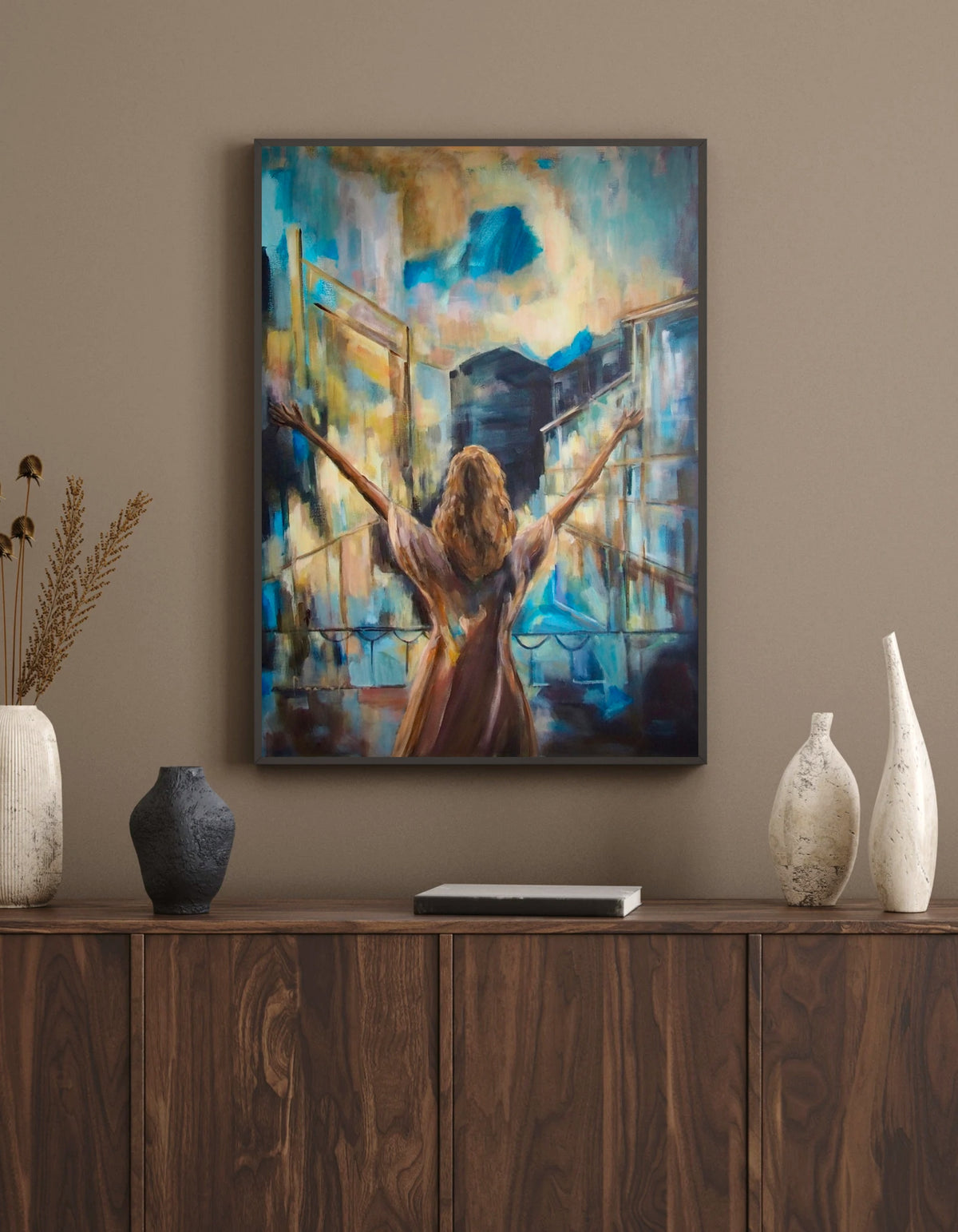 I Am Wild Possibility fine art print by Swedish artist Ingela Johansson in a dark frame above a walnut sideboard with ceramic vases