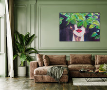 "In Green" – A striking art print by Ingela Johansson of a woman’s face partly covered in leaves, with vivid red lips, in an expressive, modern style.