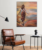 “Leap of Light” hanging above a minimalist Scandinavian sofa. The painting’s warm yellow tones add energy to the neutral-toned living space.