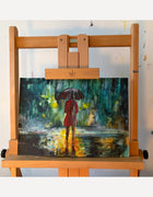 Original acrylic painting on paper by Ingela Johansson displayed on a wooden easel in the artist’s studio.