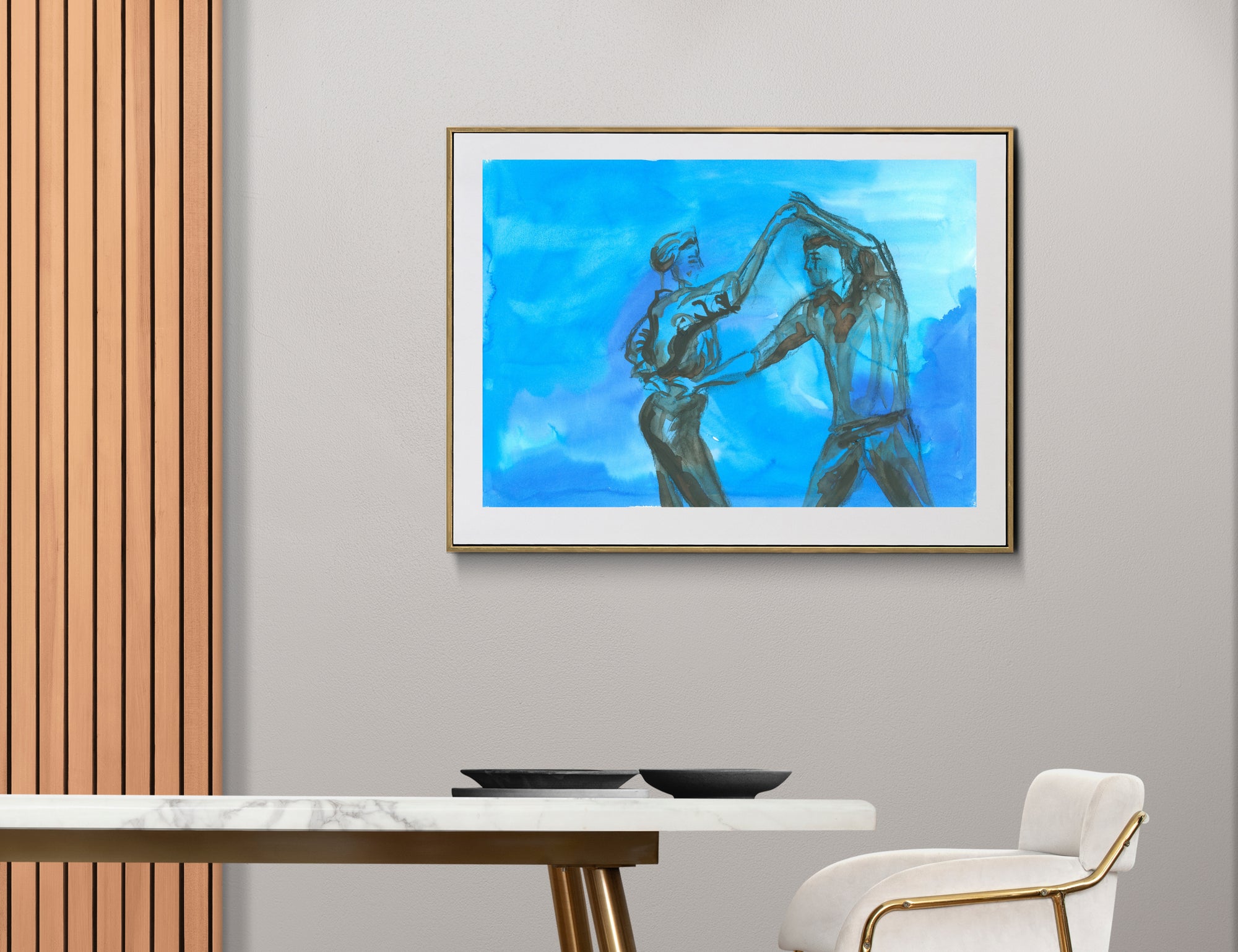 Framed art print of Spinning in Sync displayed in a modern Scandinavian interior. The painting features a couple dancing with energy and rhythm against a vibrant blue background, evoking movement and connection.