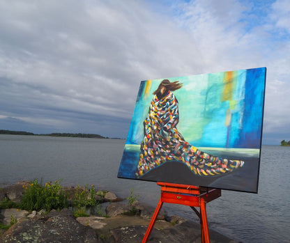 "Storm" acrylic painting by Swedish artist Ingela Johansson on an easel by the lake