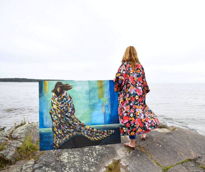 Artist Ingela Johansson with her painting "Storm"