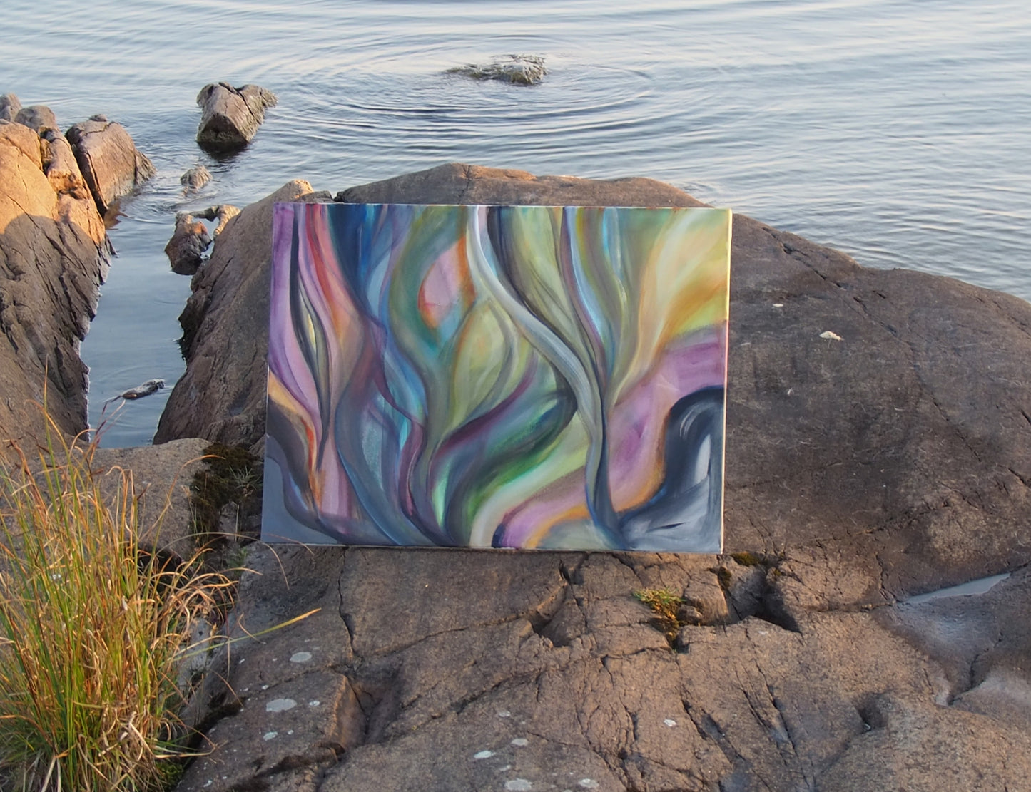 Artwork Sunset Currents on the cliffs that inspired the painting. By Ingela Johansson