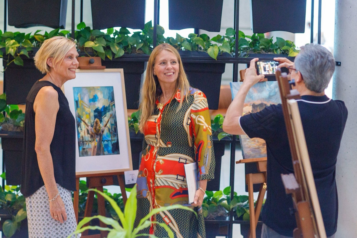 Visitor and artist Ingela Johansson at exhibition in Tacoma with Barlow Gallery