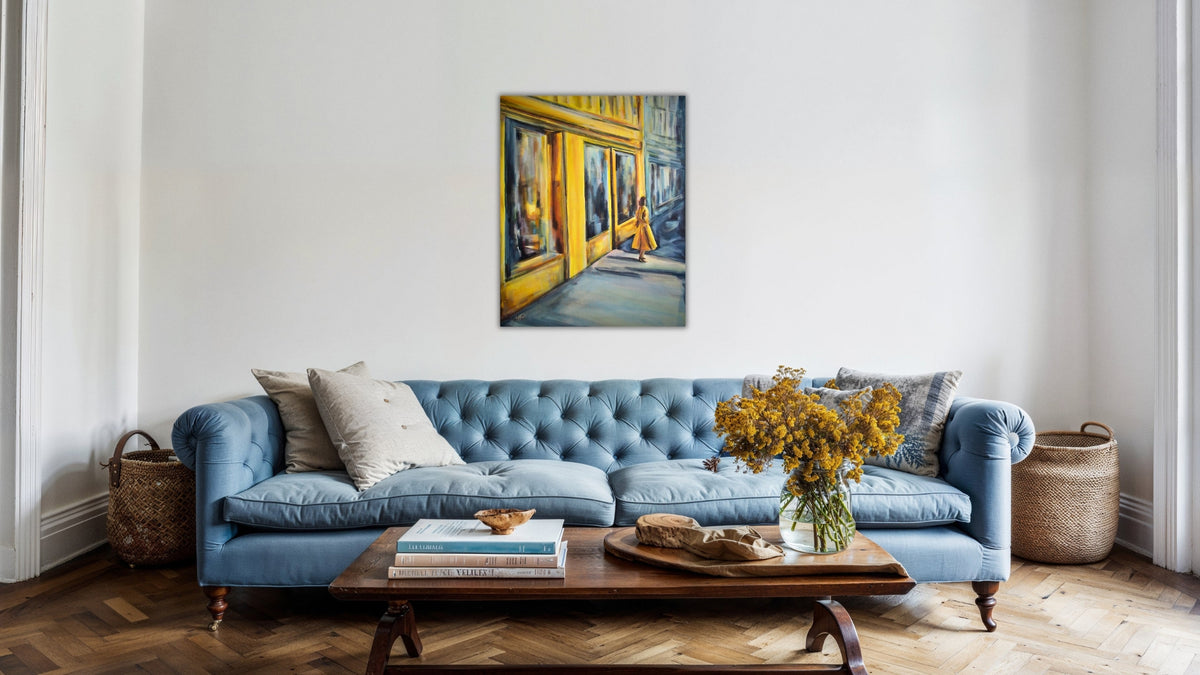 *At the Corner of Hope and Forgotten Dreams* by Ingela Johansson in a contemporary interior with a blue sofa.