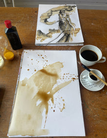 Ingela Johansson painting Before Coffee, capturing the splash of coffee and ink on paper