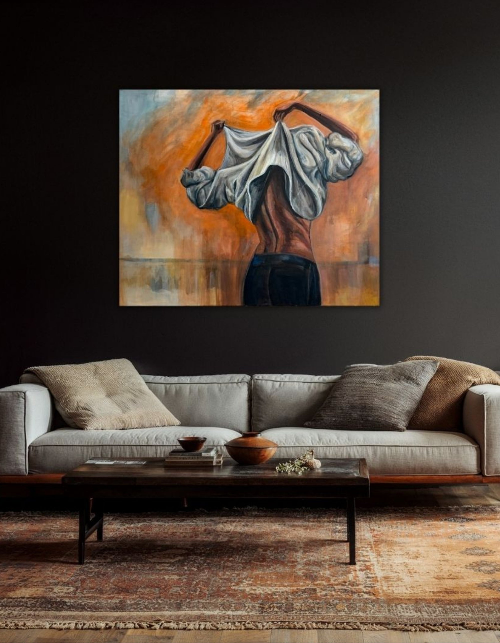 Courage, an original mixed media painting by Swedish artist Ingela Johansson — a figure seen from behind pulling a pale garment over her head against a warm orange abstract background, a story about daring to show what's beneath the surface