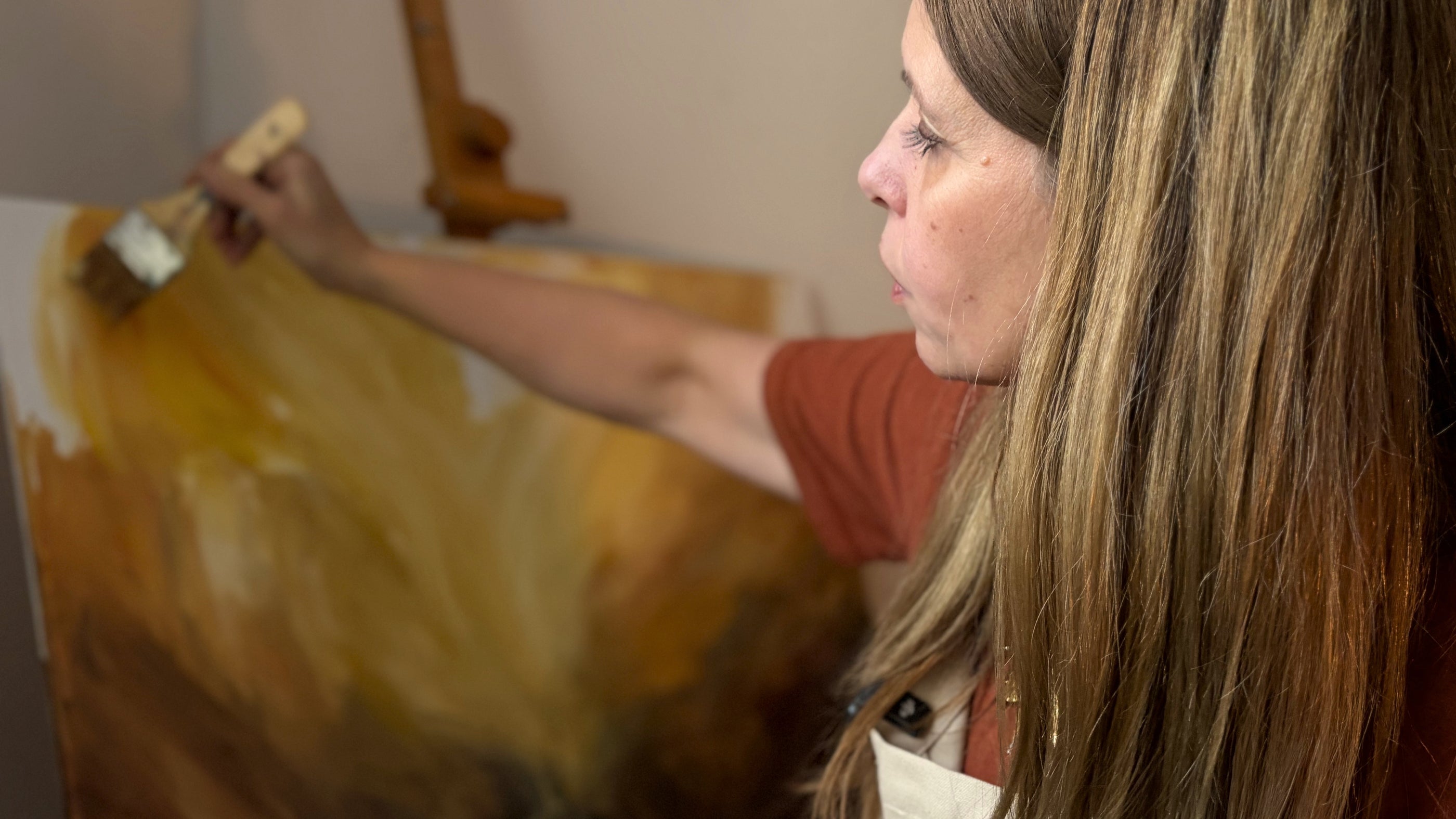 Ingela Johansson painting in her studio — original art.