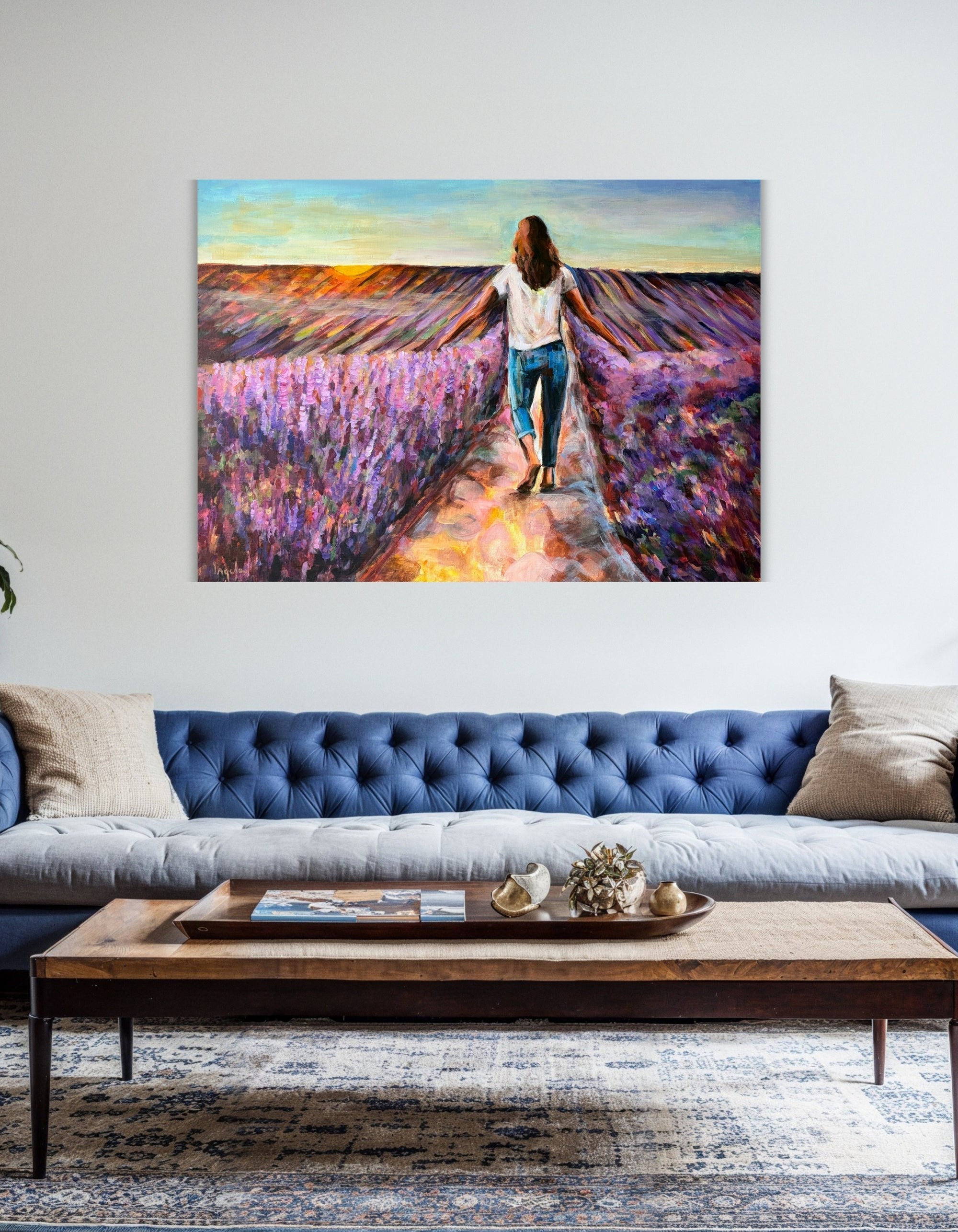 Joie de Vivre, original acrylic painting by Swedish artist Ingela Johansson, displayed over a blue sofa in a Nordic style interior