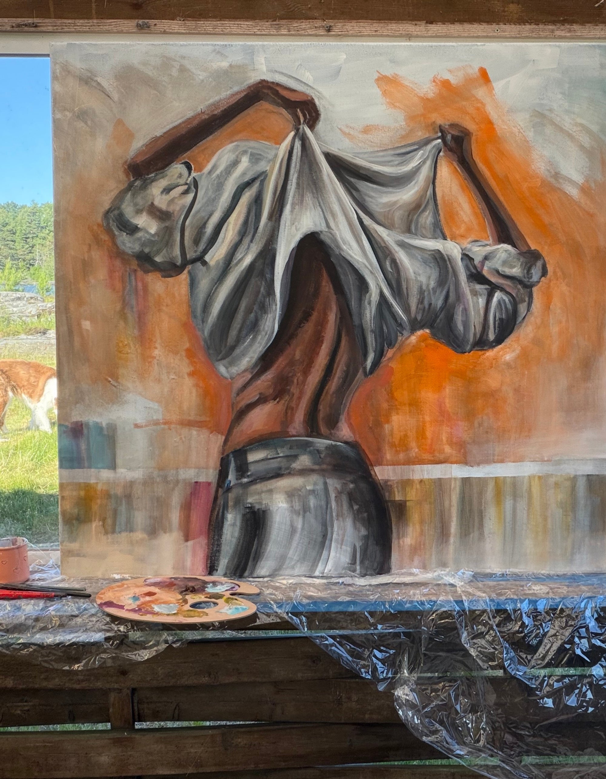 Swedish artist Ingela Johansson working on the painting Courage in her studio