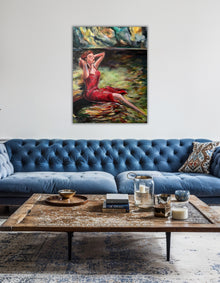 The Living Current painting by Ingela Johansson in a living room with blue couch – wall art inspiration