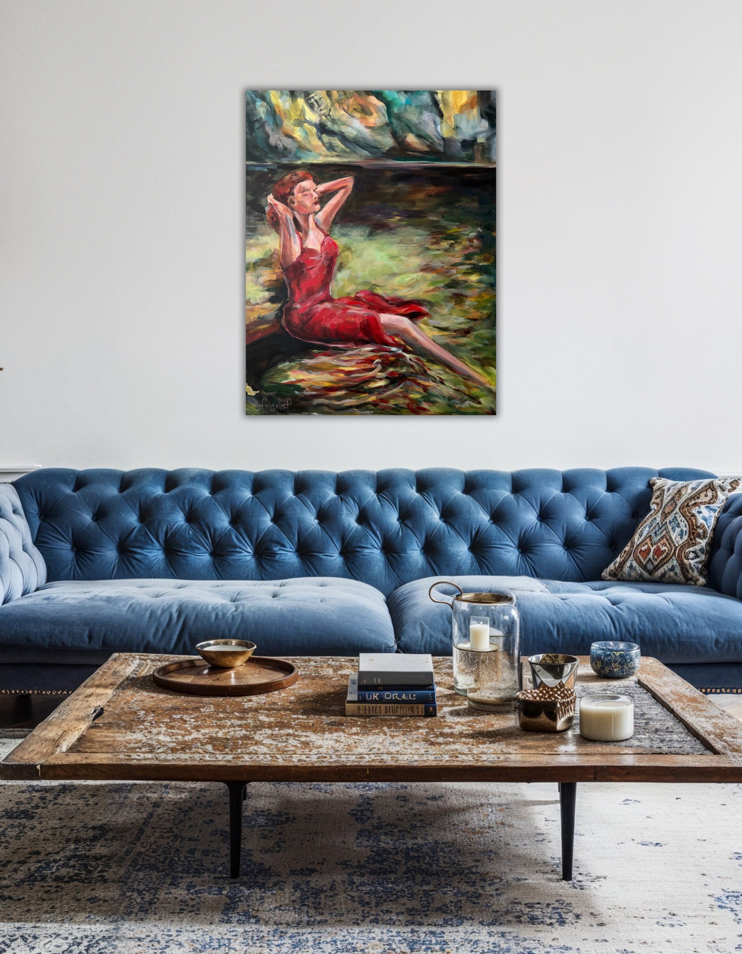 The Living Current painting by Ingela Johansson in a living room with blue couch – wall art inspiration